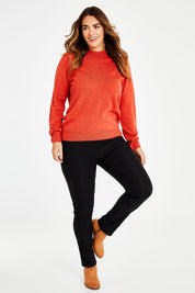 Model Laura wearing size L of The Essential Soft Jumper in colour Ginger, from the front, showing the whole outfit