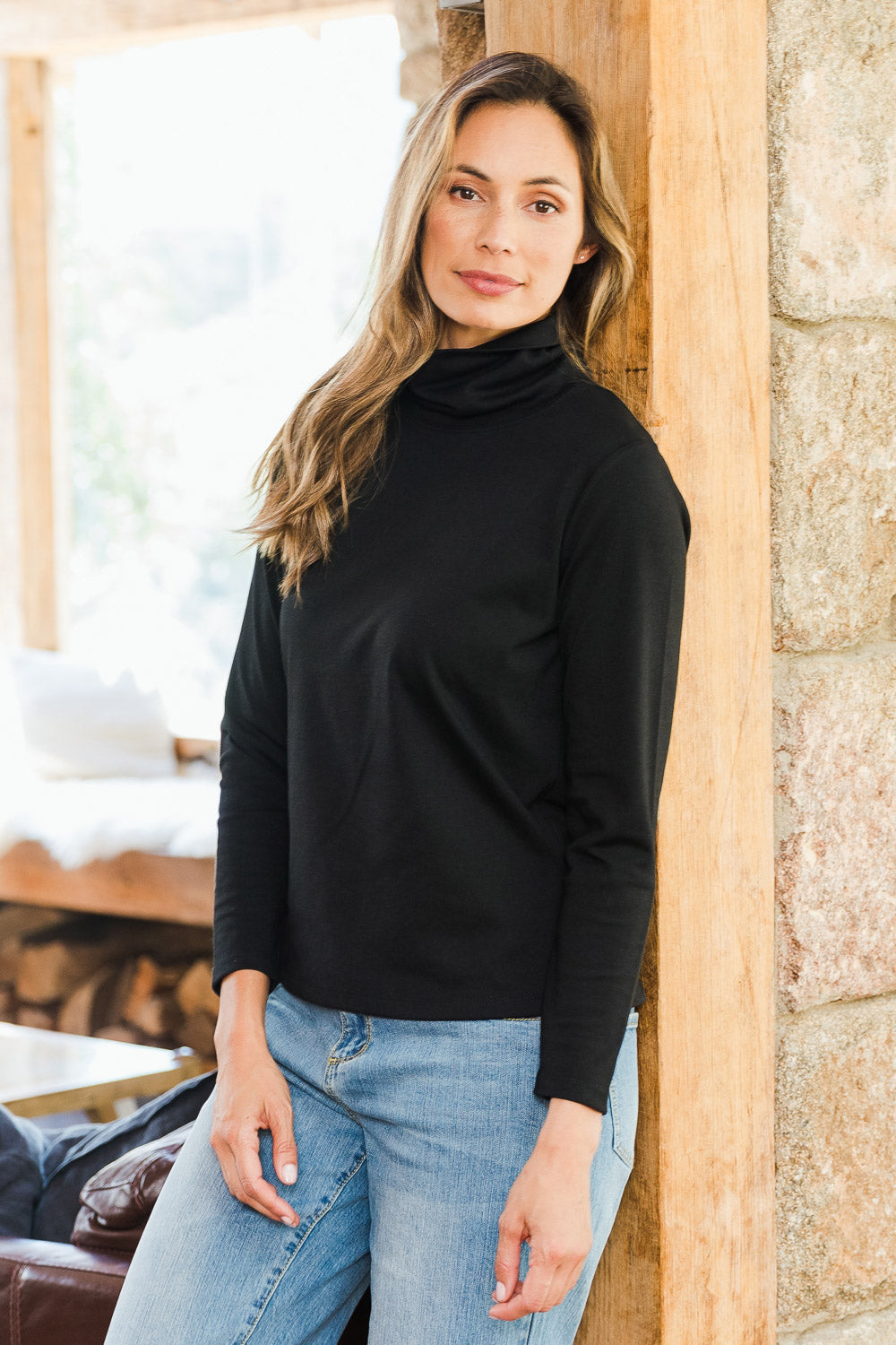 Model Amanda wearing size 10 of The Easy Wear Skivvy in colour Black (Black), from the front, showing the whole outfit