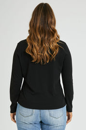 Model Laura wearing size 14 of The Easy Wear Skivvy in colour Black (Black), from the back