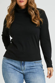 Model Laura wearing size 14 of The Easy Wear Skivvy in colour Black (Black), from the front, cropped image