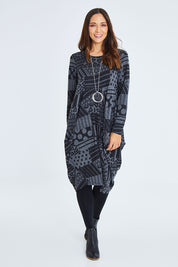 Model Cara wearing size 10 of The Jacquard Bounce Dress in colour Charcoal (Grey), from the front, showing the whole outfit