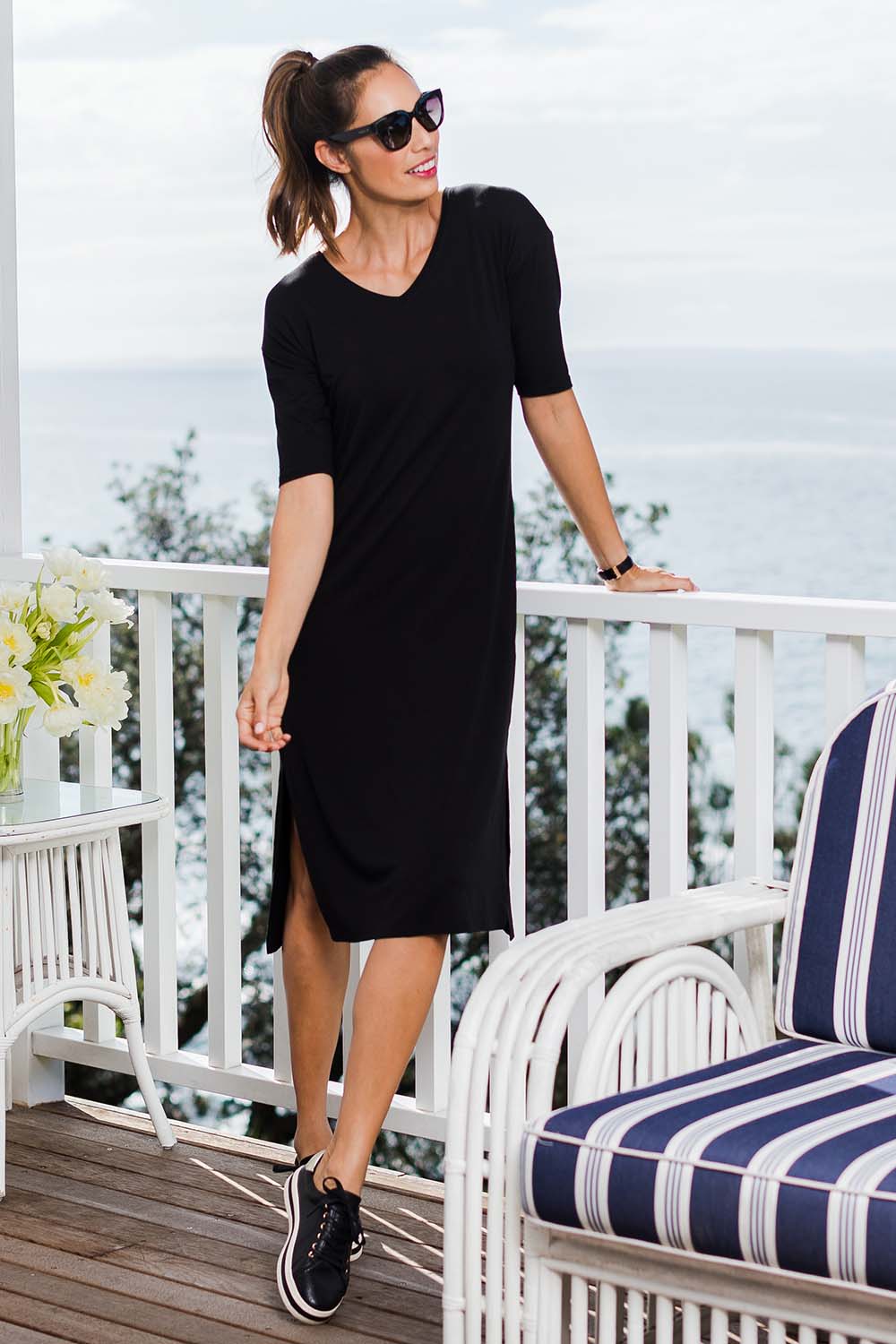 Model Amanda wearing size 10 of The 3/4 Sleeve Mid Length Tee Dress in colour Black (Black), from the front, showing the whole outfit