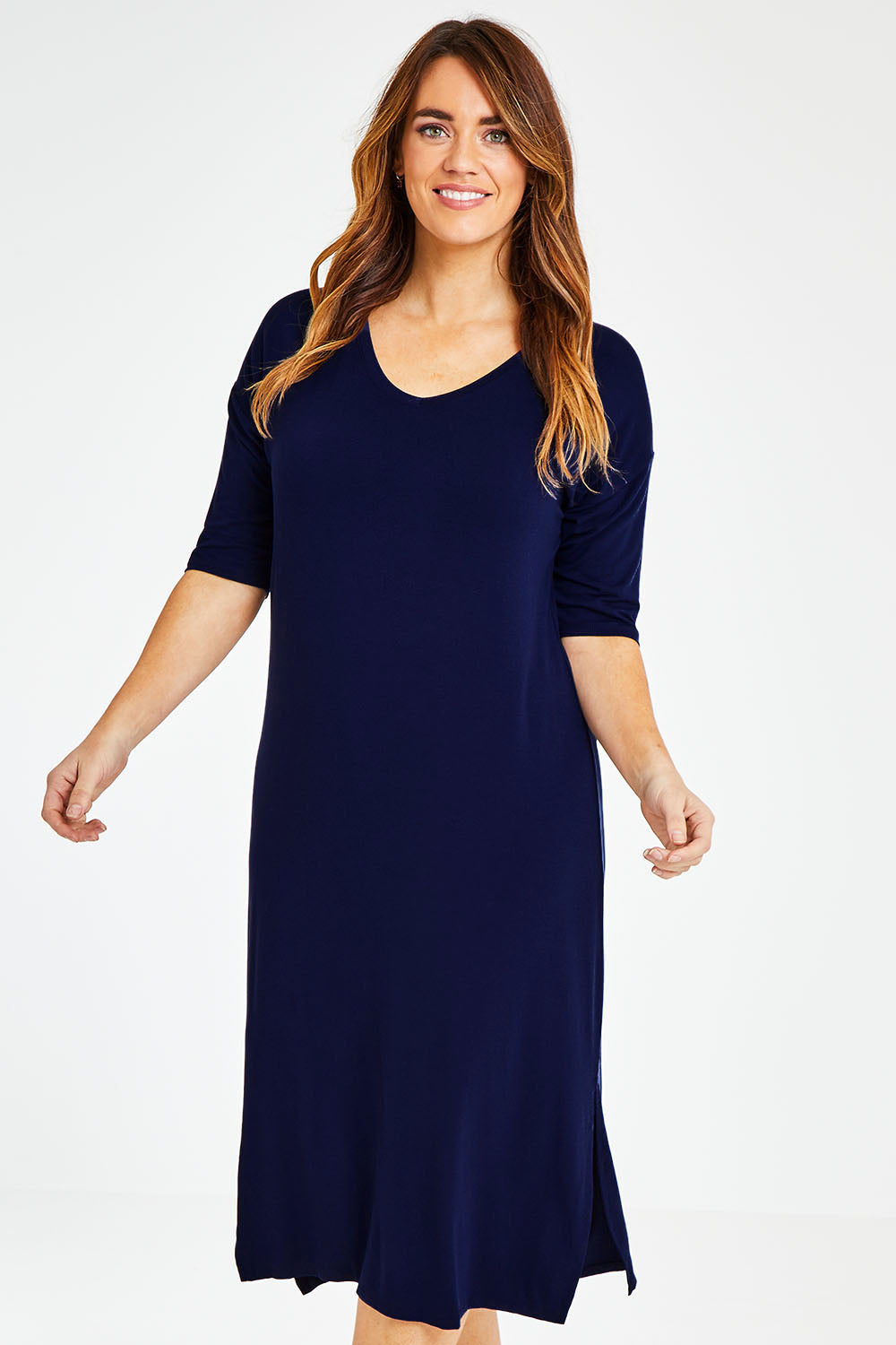 Model Laura wearing size 14 of The 3/4 Sleeve Mid Length Tee Dress in colour Navy (Blue), from the front, cropped image