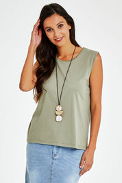 Model Vitoria wearing size 10 of The Essential Crew Neck Tank in colour Olive (Green), from the front, cropped image