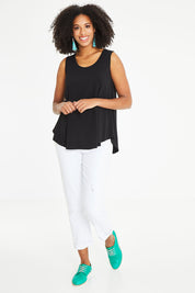 Model Schanez wearing size 10 of The Essential Swing Tank in colour Black (Black), from the front, showing the whole outfit