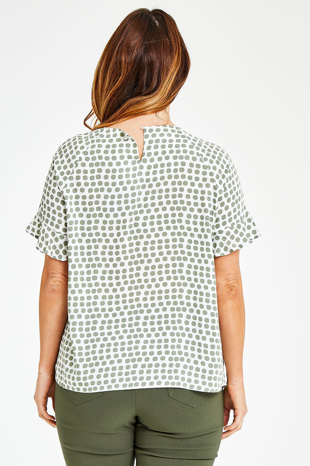 Model Laura wearing size 14 of The Frill Sleeve Blouse in colour Khaki (Green), from the back