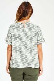 Model Laura wearing size 14 of The Frill Sleeve Blouse in colour Khaki (Green), from the back