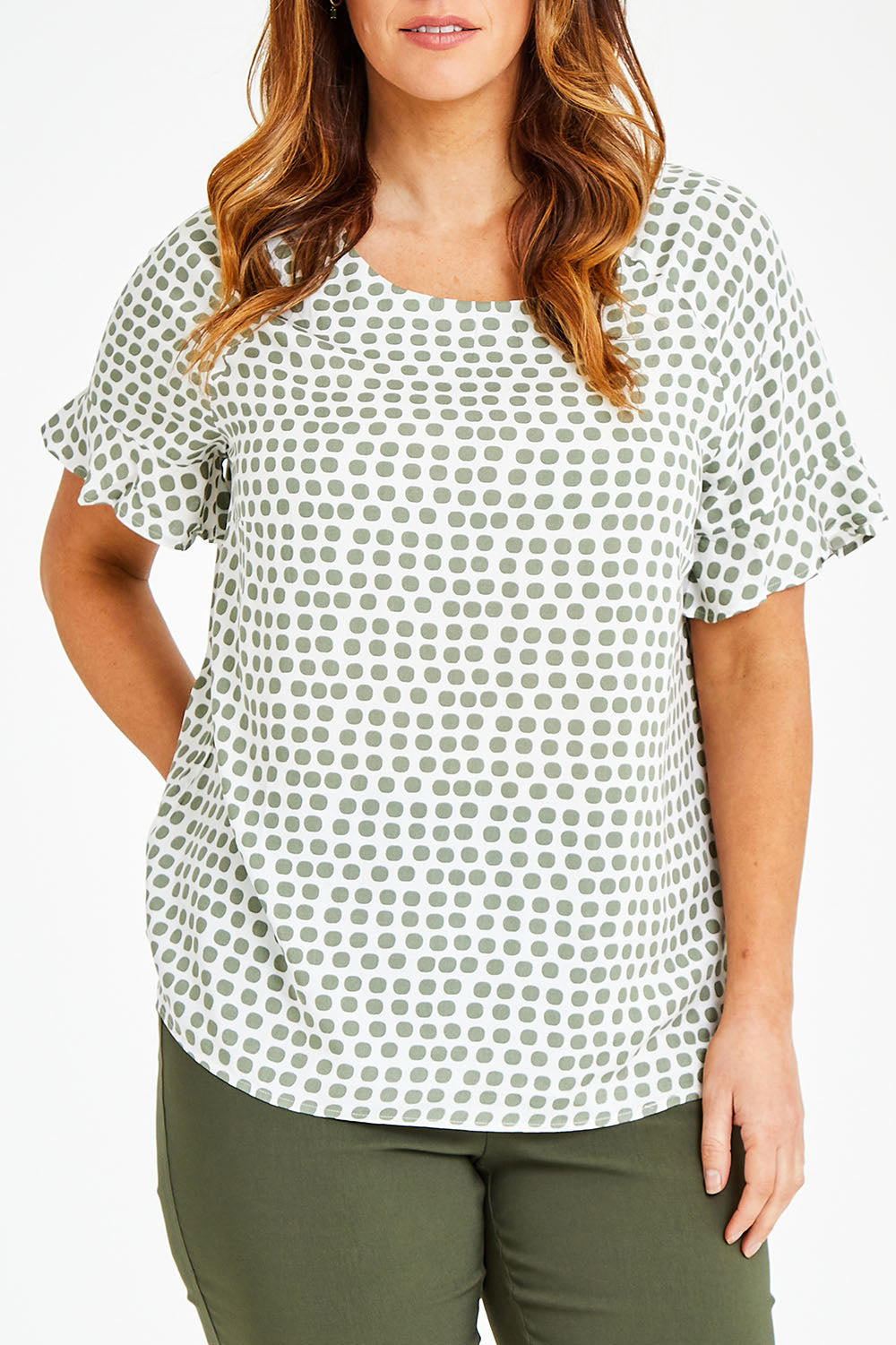Model Laura wearing size 14 of The Frill Sleeve Blouse in colour Khaki (Green), from the front, cropped image