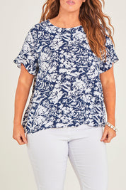 Model Laura wearing size 14 of The Frill Sleeve Blouse in colour Navywhite (Blue), from the front, cropped image