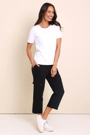 Model Amandam wearing size 10 of the The Cotton Blend Cargo Pant - Black in colour Black, from the front