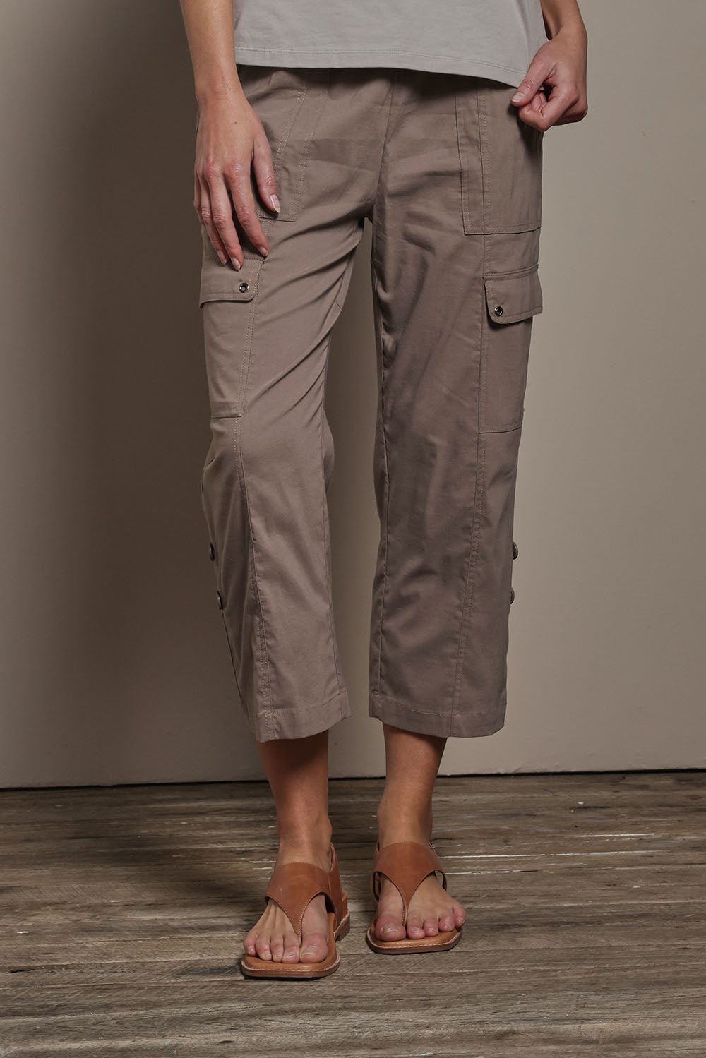 Model Madeline wearing size 10 of The Cotton Blend Cargo Pant in colour Coffee, from the front, cropped image