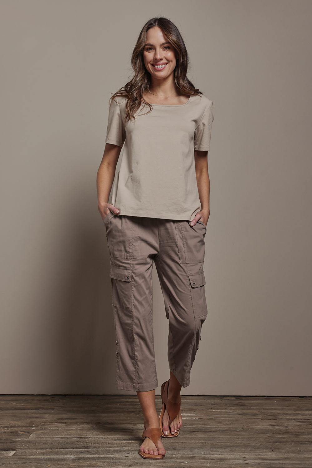 Model Madeline wearing size 10 of The Cotton Blend Cargo Pant in colour Coffee, from the front, showing the whole outfit