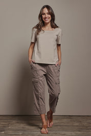 Model Madeline wearing size 10 of The Cotton Blend Cargo Pant in colour Coffee, from the front, showing the whole outfit
