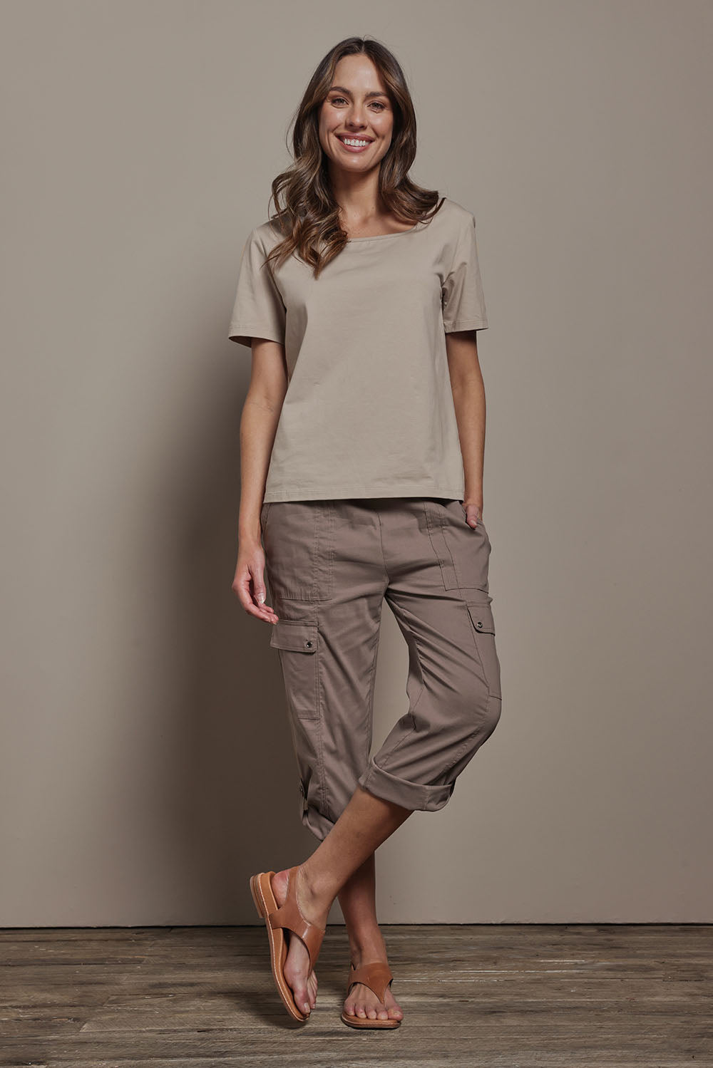 Model Madeline wearing size 10 of The Cotton Blend Cargo Pant in colour Coffee, from the front, showing the whole outfit