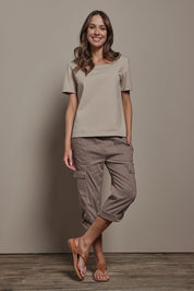 Model Madeline wearing size 10 of The Cotton Blend Cargo Pant in colour Coffee, from the front, showing the whole outfit