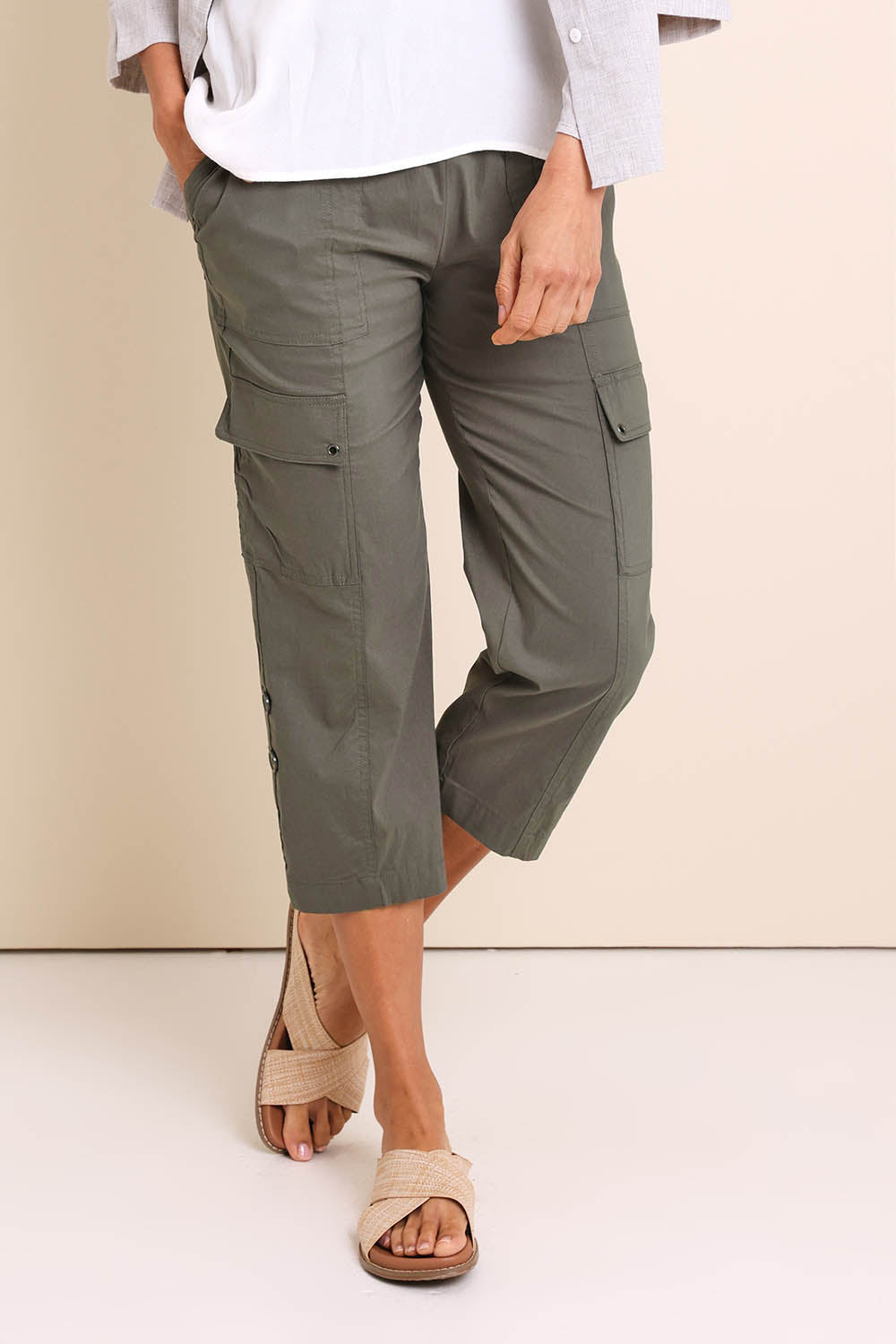 Model Amandam wearing size 10 of the :The Lightweight Cotton Blend Cargo Pant  - Moss in colour Moss, in a cropped view