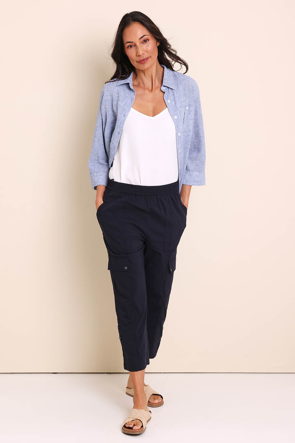Model Amandam wearing size 10 of the The Cotton Blend Cargo Pant - Navy in colour Navy, from the front