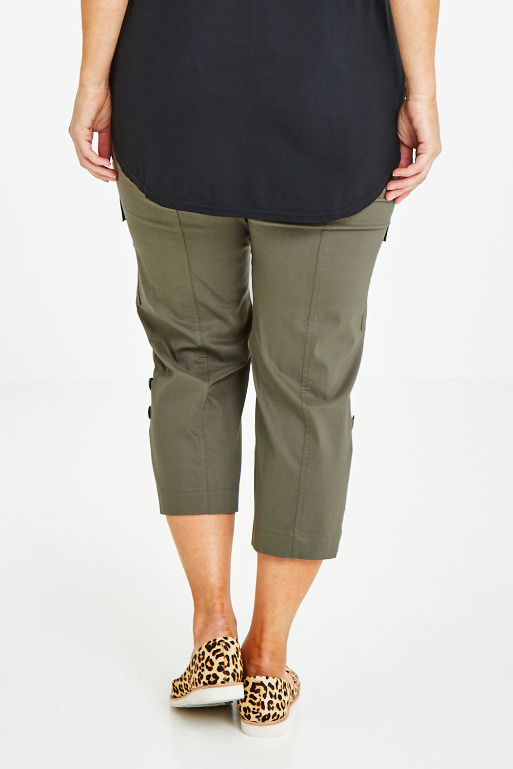 Model Laura wearing size 14 of The Cotton Blend Cargo Pant in colour Olive (Green), from the back