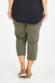 Model Laura wearing size 14 of The Cotton Blend Cargo Pant in colour Olive (Green), from the back