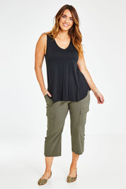 Model Laura wearing size 14 of The Cotton Blend Cargo Pant in colour Olive (Green), from the front, showing the whole outfit