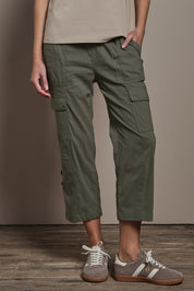Model Madeline wearing size 10 of The Cotton Blend Cargo Pant in colour Olive (Green), from the front, cropped image
