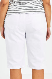 Model Sasha-Lee wearing size 16 of The Bermuda Pull On Short in colour White (White), from the back