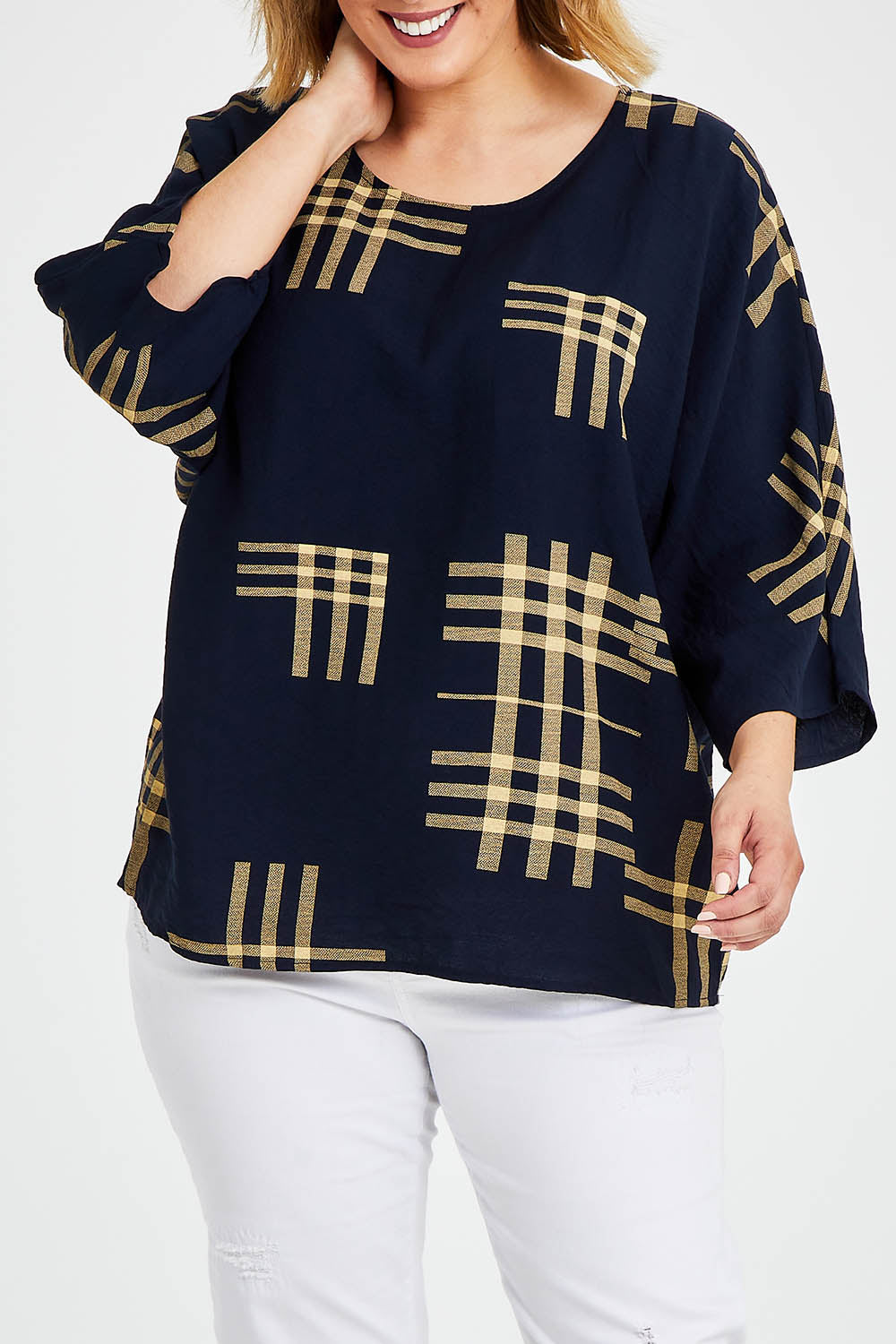 Model Jess wearing size 14 of The Relax Fit Printed Top in colour Navycamel (Blue), from the front, cropped image