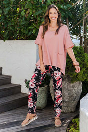 Model Amanda wearing size 10 of The Upcycled Cotton Pocket Detail Top in colour Peach, from the front, showing the whole outfit