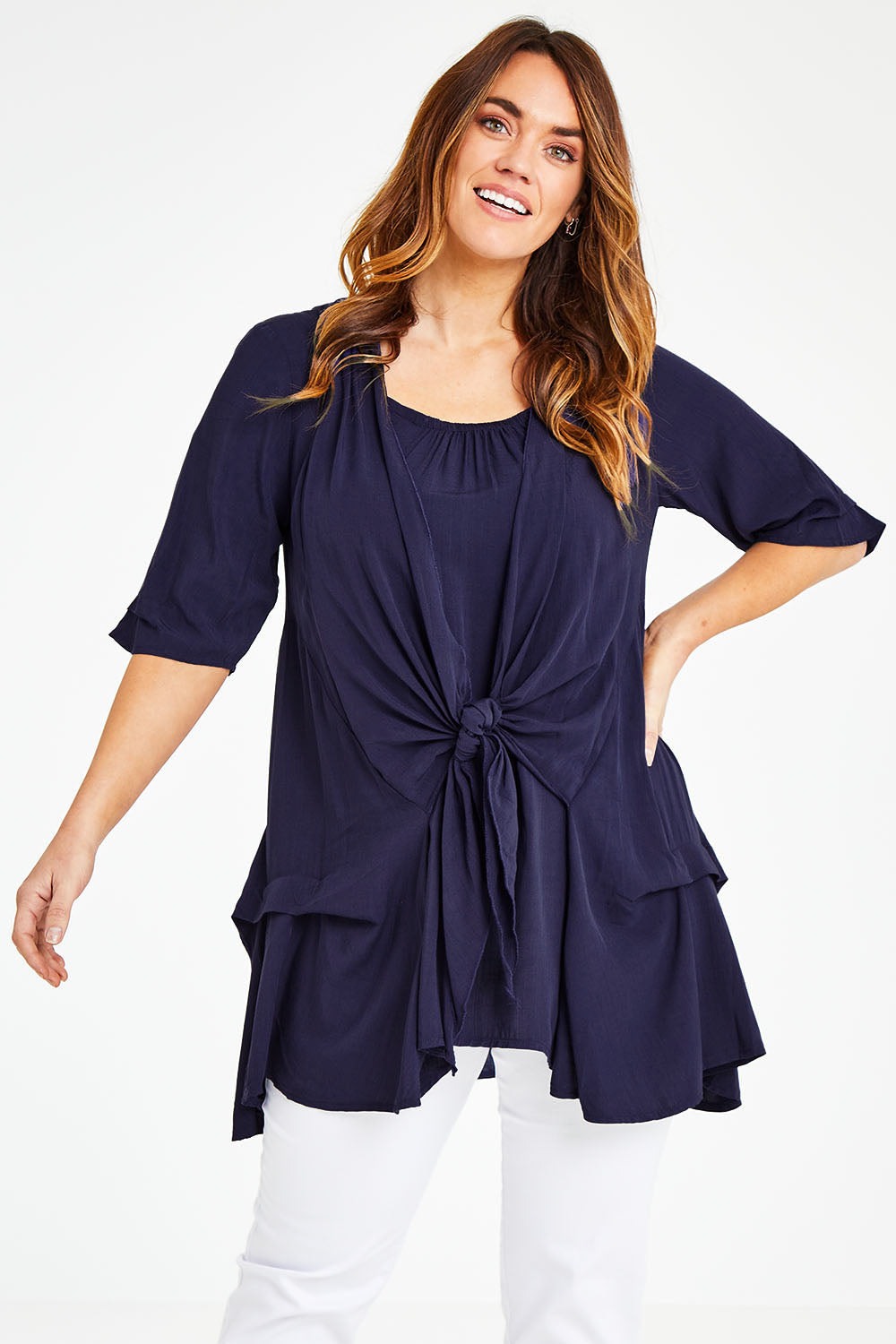Model Laura wearing size 14 of The Tie Detail 2 For Top in colour Navy (Blue), from the front, cropped image