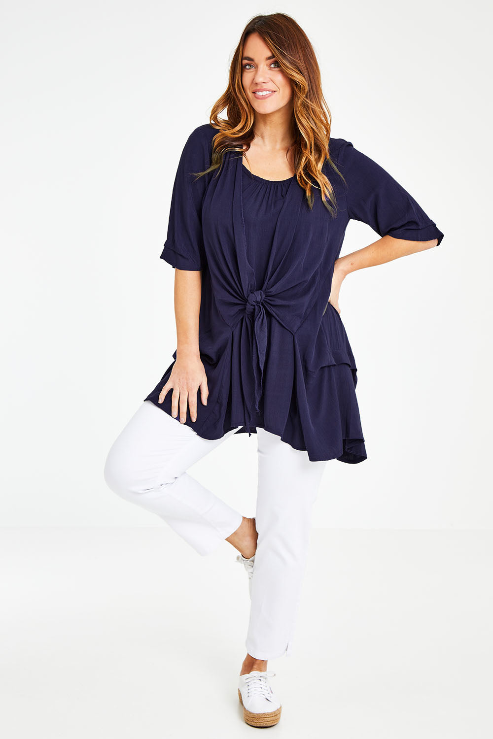 Model Laura wearing size 14 of The Tie Detail 2 For Top in colour Navy (Blue), from the front, showing the whole outfit
