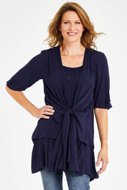Model Naomi wearing size 10 of The Tie Detail 2 For Top in colour Navy (Blue), from the front, cropped image