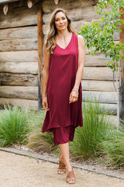 Model Amanda wearing size 10 of The Everyday Layered Dress in colour Cherryred (Red), from the front, showing the whole outfit
