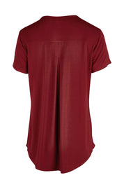 Product shot of The Back Pleat Detail Tee in colour Cherryred (Red), from the back