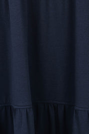 Product shot of The Tiered Jersey Dress in colour Navy (Blue), detail