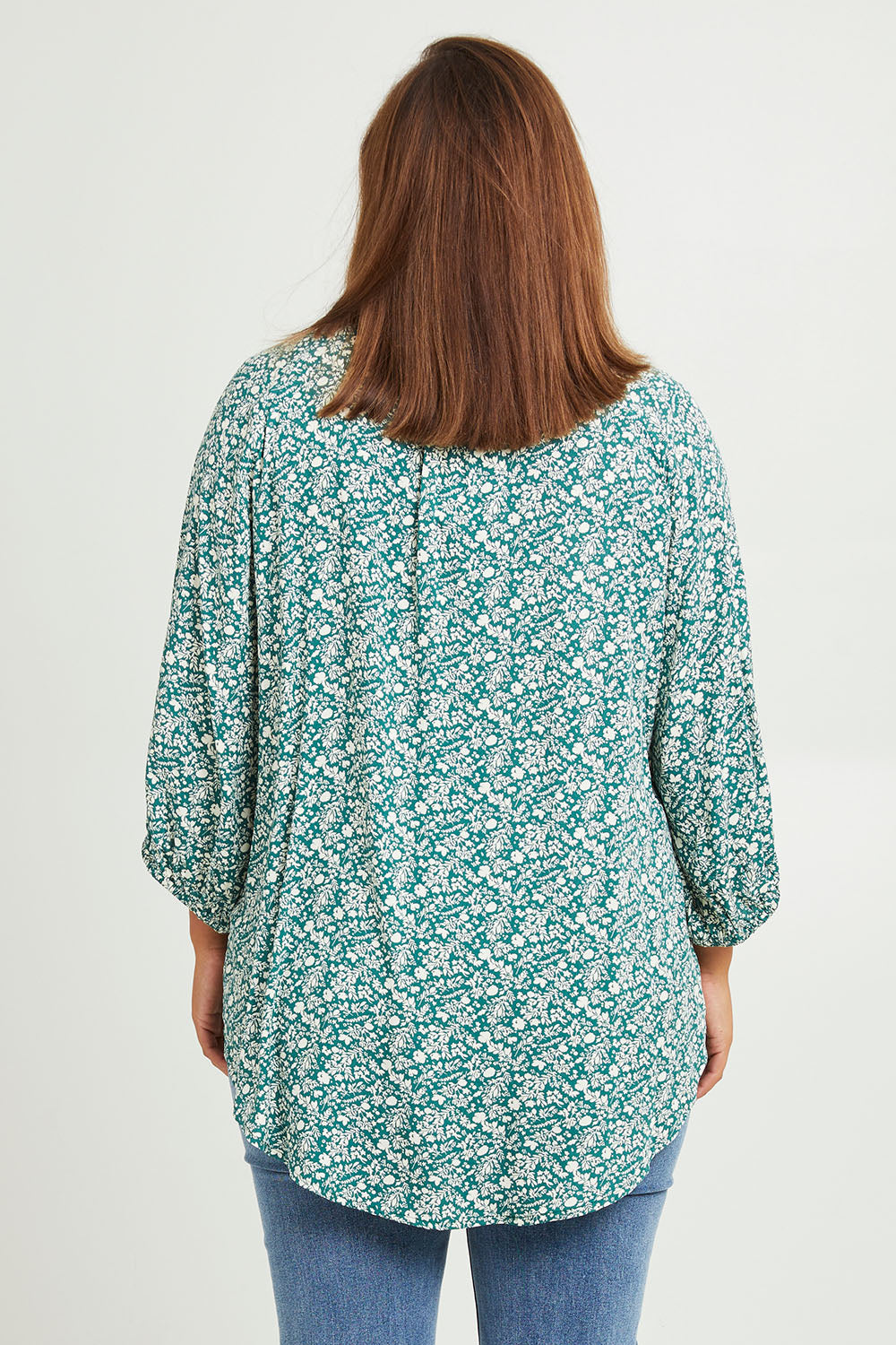 Model Monique wearing size 14 of The Perfect Relaxed Fit Shirt in colour Greenivory (Green), from the back