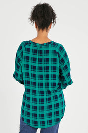 Model Noli wearing size 14 of The Perfect Relaxed Fit Shirt in colour Navycheck (Blue), from the back