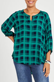 Model Noli wearing size 14 of The Perfect Relaxed Fit Shirt in colour Navycheck (Blue), from the front, cropped image