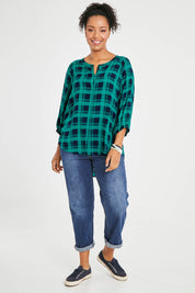Model Noli wearing size 14 of The Perfect Relaxed Fit Shirt in colour Navycheck (Blue), from the front, showing the whole outfit