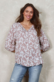 Model Madeline wearing size 10 of The Perfect Relaxed Fit Shirt in colour Nudeblush (Pink), from the front, showing the whole outfit
