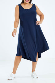 Model Sasha-Lee wearing size 16 of The Recycled High Low Dress in colour Navy (Blue), from the front, cropped image