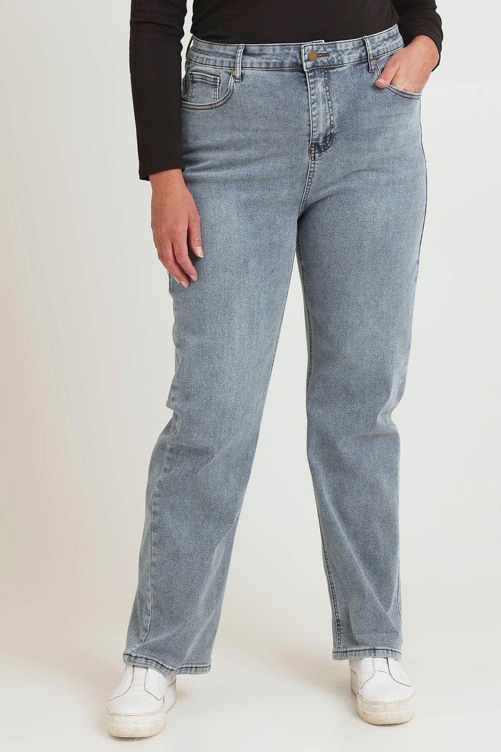 Model Chanel wearing size 16 of The Keepers Highwaisted Straight Jean in colour Lightdenim (Blue), from the front, cropped image