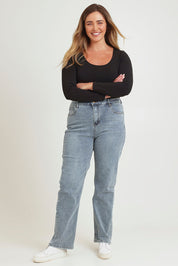 Model Chanel wearing size 16 of The Keepers Highwaisted Straight Jean in colour Lightdenim (Blue), from the front, showing the whole outfit