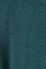 Product shot of The Long Sleeve Bamboo Dress in colour Forest (Green), detail
