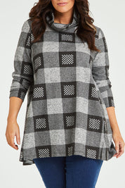 Model Laura wearing size 14 of The Woolly Knit High Low Tunic in colour Blackgrey (Black), from the front, cropped image