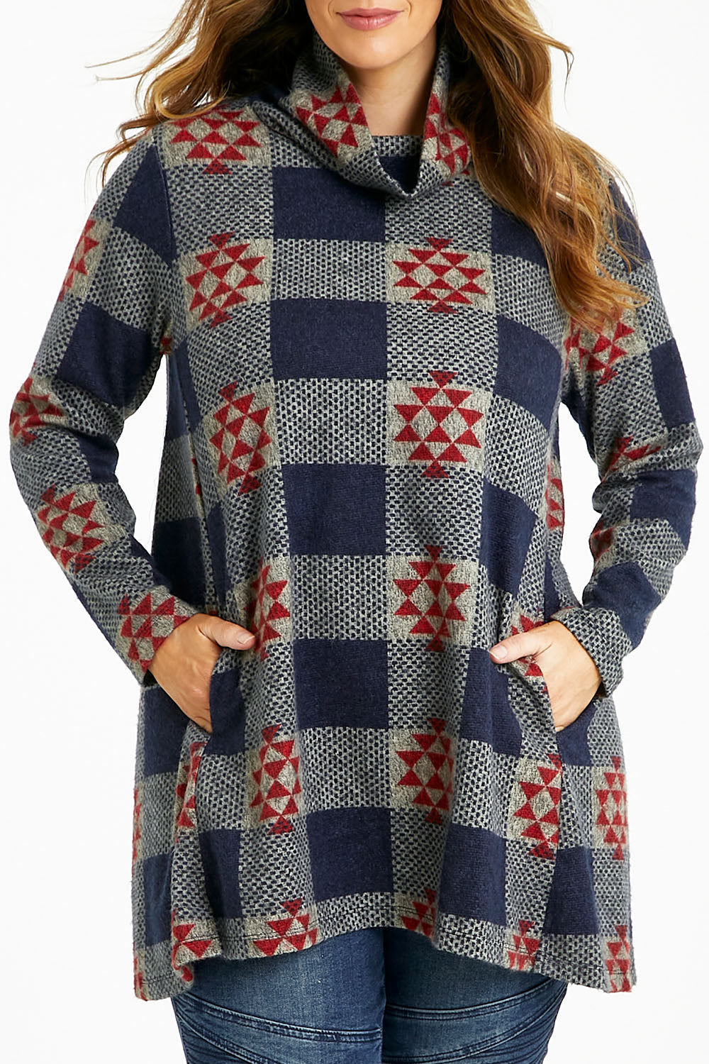 Model Laura wearing size 14 of The Woolly Knit High Low Tunic in colour Navyred (Blue), from the front, cropped image