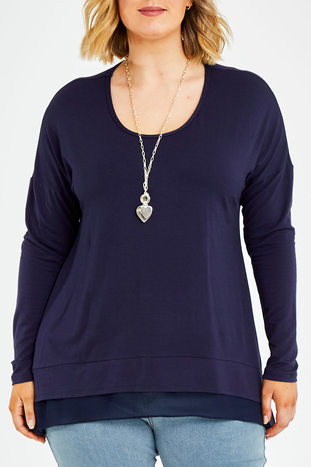 Model Jess wearing size 14 of The Chiffon Underlay Layered Tee in colour Darknavy (Blue), from the front, cropped image