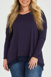 Model Katie wearing size 16 of The Chiffon Underlay Layered Tee in colour Darknavy (Blue), from the front, cropped image