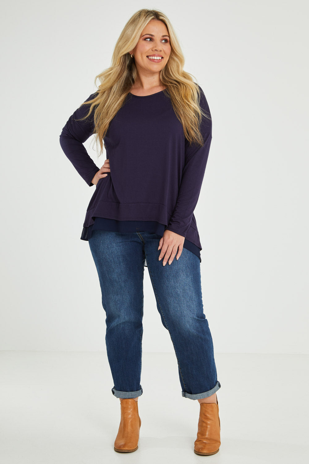 Model Katie wearing size 16 of The Chiffon Underlay Layered Tee in colour Darknavy (Blue), from the front, showing the whole outfit