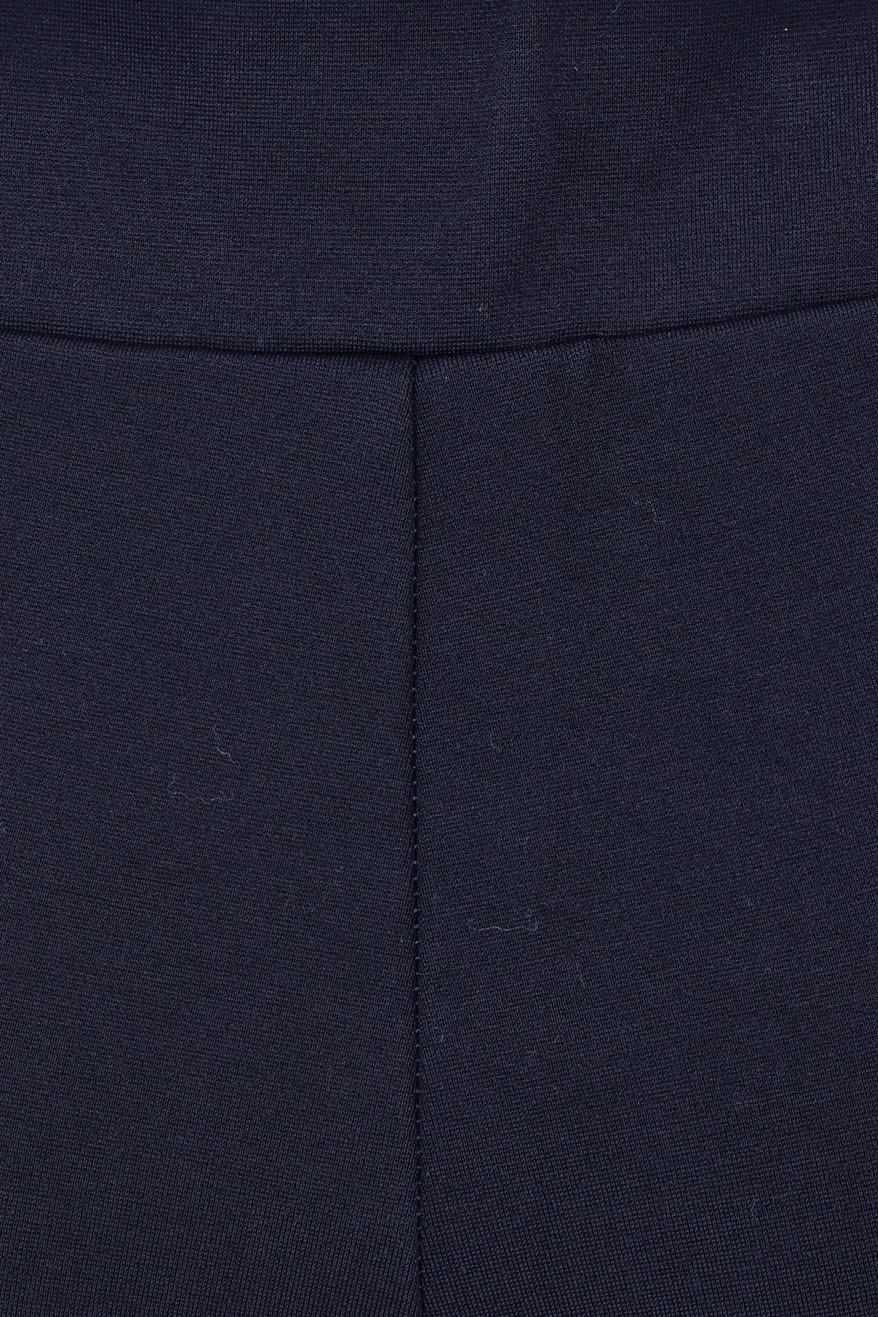 Product shot of The Pull On Ponte Boot Leg Pant in colour Darknavy (Blue), detail