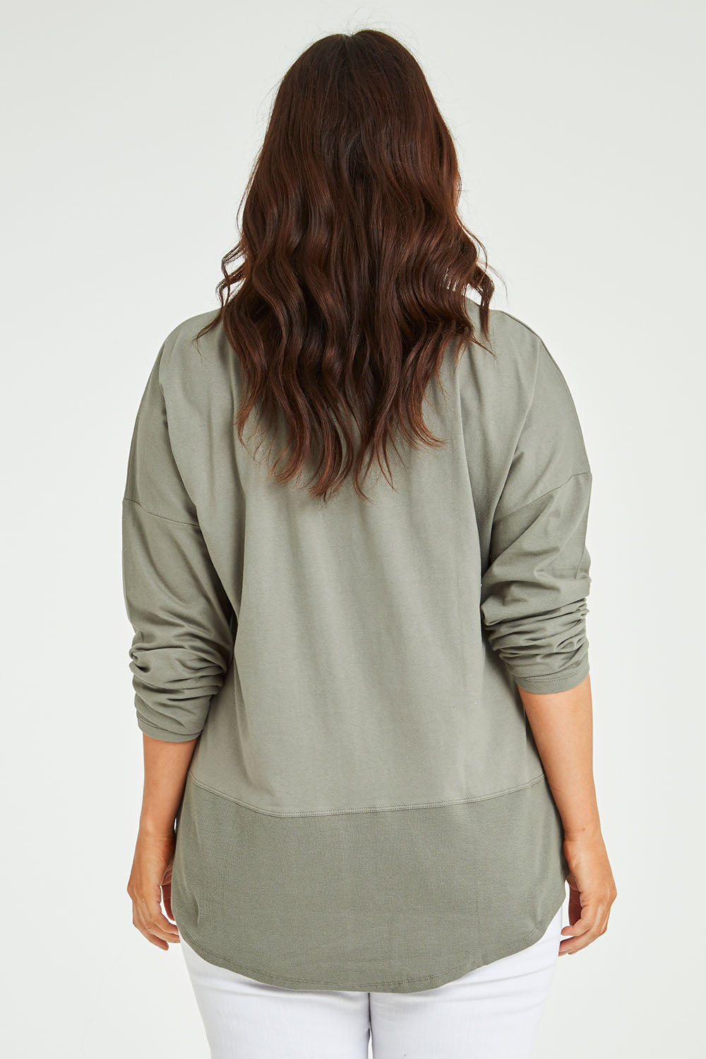 Model Laura wearing size 14 of The Rib Trim Long Sleeve Tee in colour Olive (Green), from the back